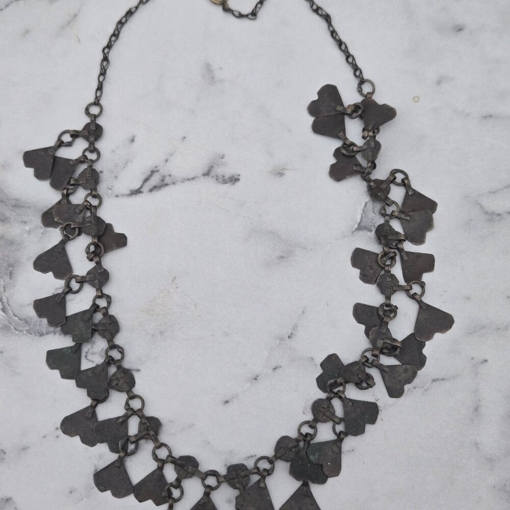 ANTIQUE BOOK PIECE ARTICULATED PRIMITIVE CUT OUT HEARTS NECKLACE
